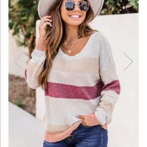 Pink lily warm sunset wishes striped sweater